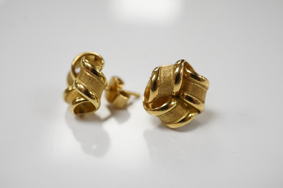 A pair of 18ct yellow gold stud earrings of knotted design with a textured finish, 1.1cm diameter each, post fittings, British hallmarks, gross weight 3.5 grams